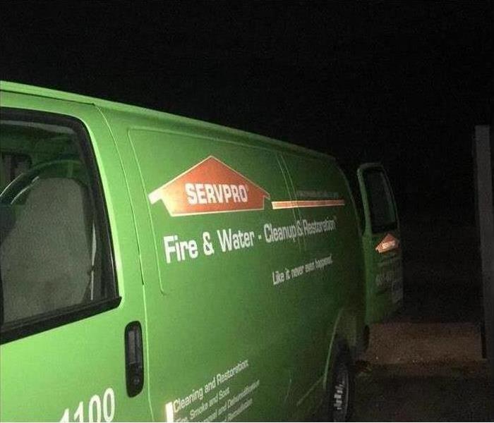 SERVPRO van out at night, working on a job.